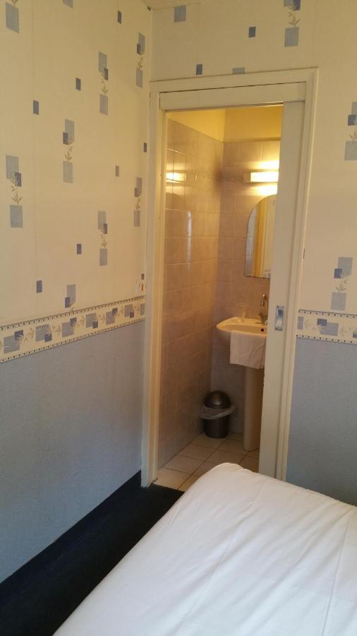 Le Grillon Hotel Pontorson Eksteriør billede
